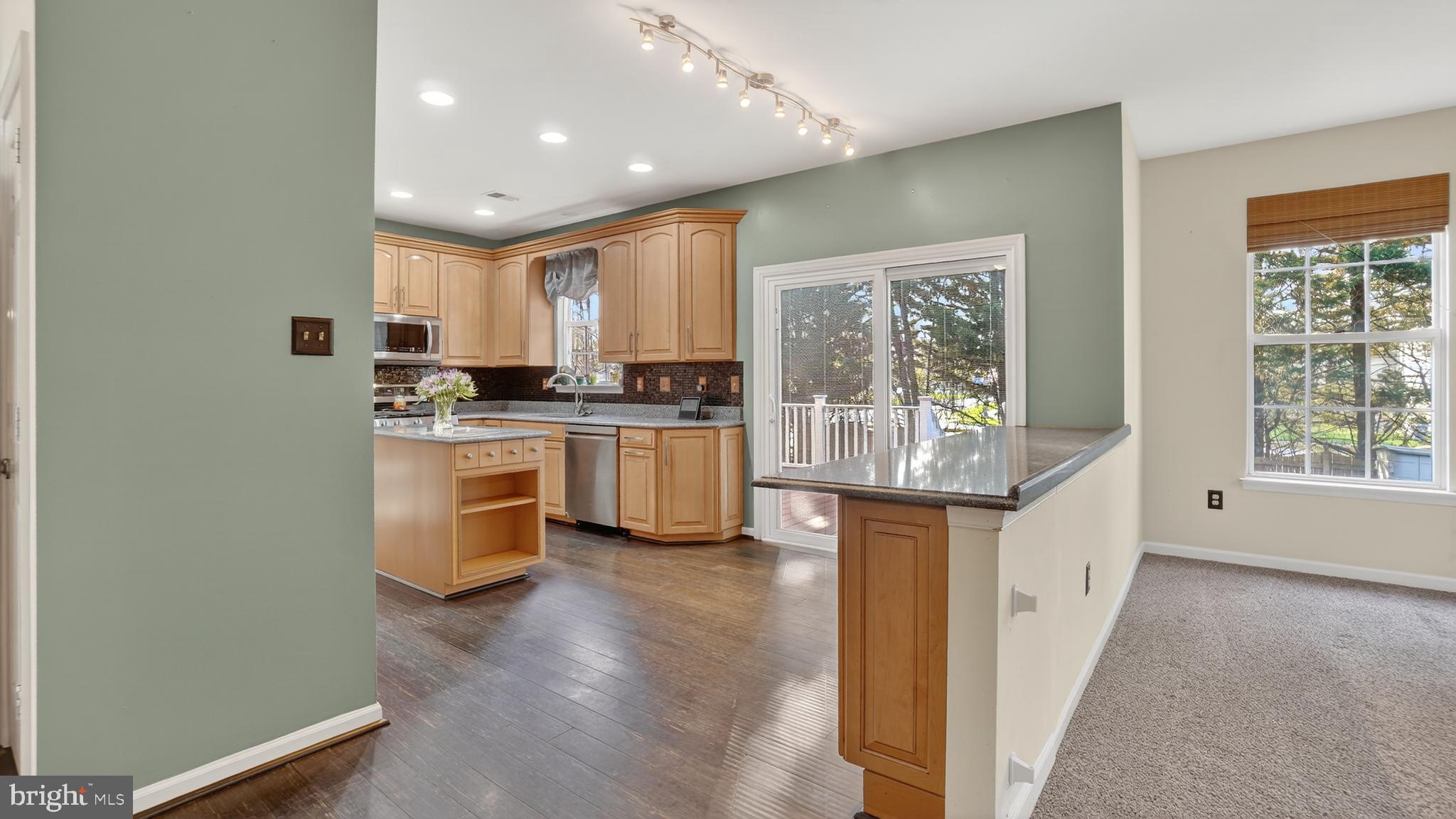 2801 Klein Court Crofton, MD 21114 - Photo 12 of 46 a kitchen with stainless steel appliances granite countertop a stove top oven