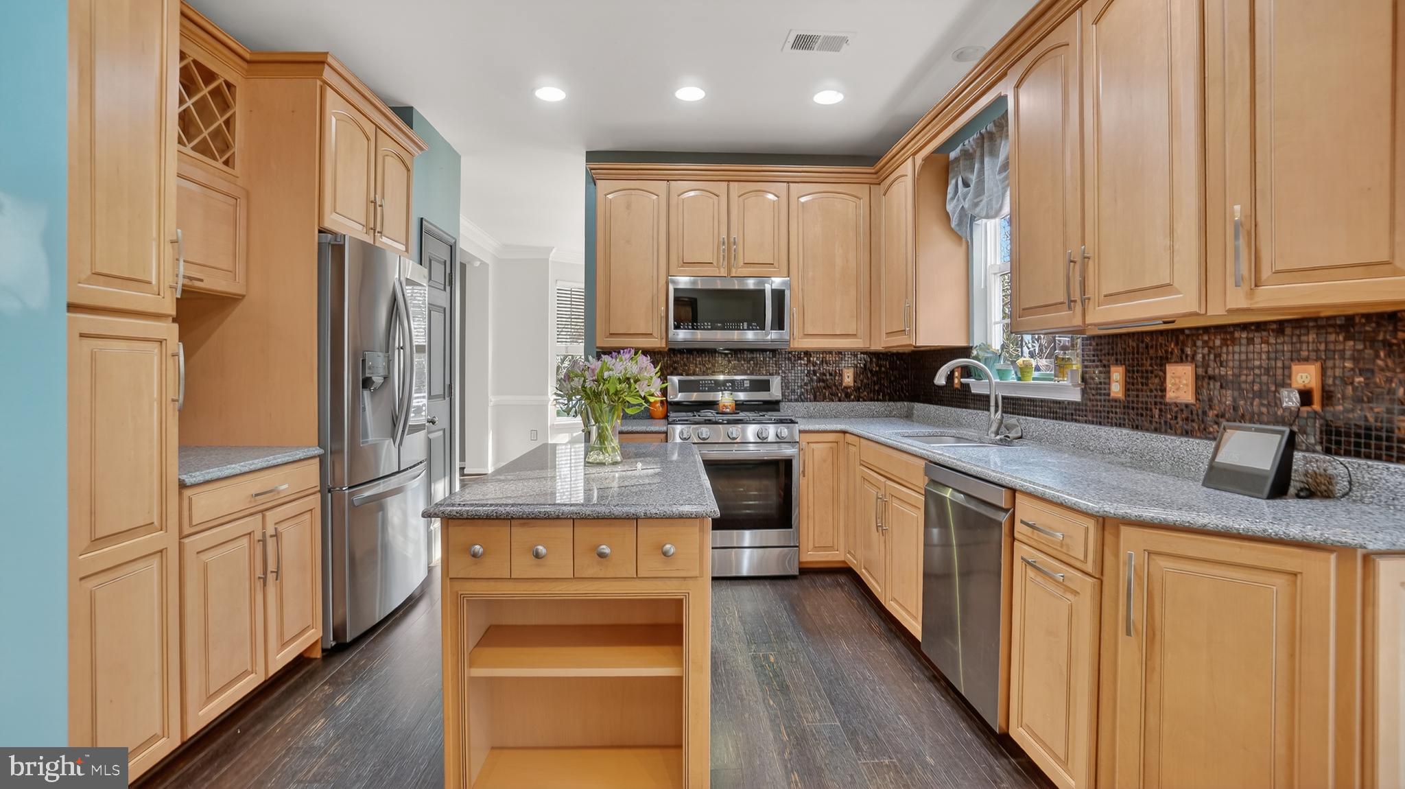 2801 Klein Court Crofton, MD 21114 - Photo 14 of 46 a kitchen with stainless steel appliances granite countertop a stove a sink a refrigerator and cabinets