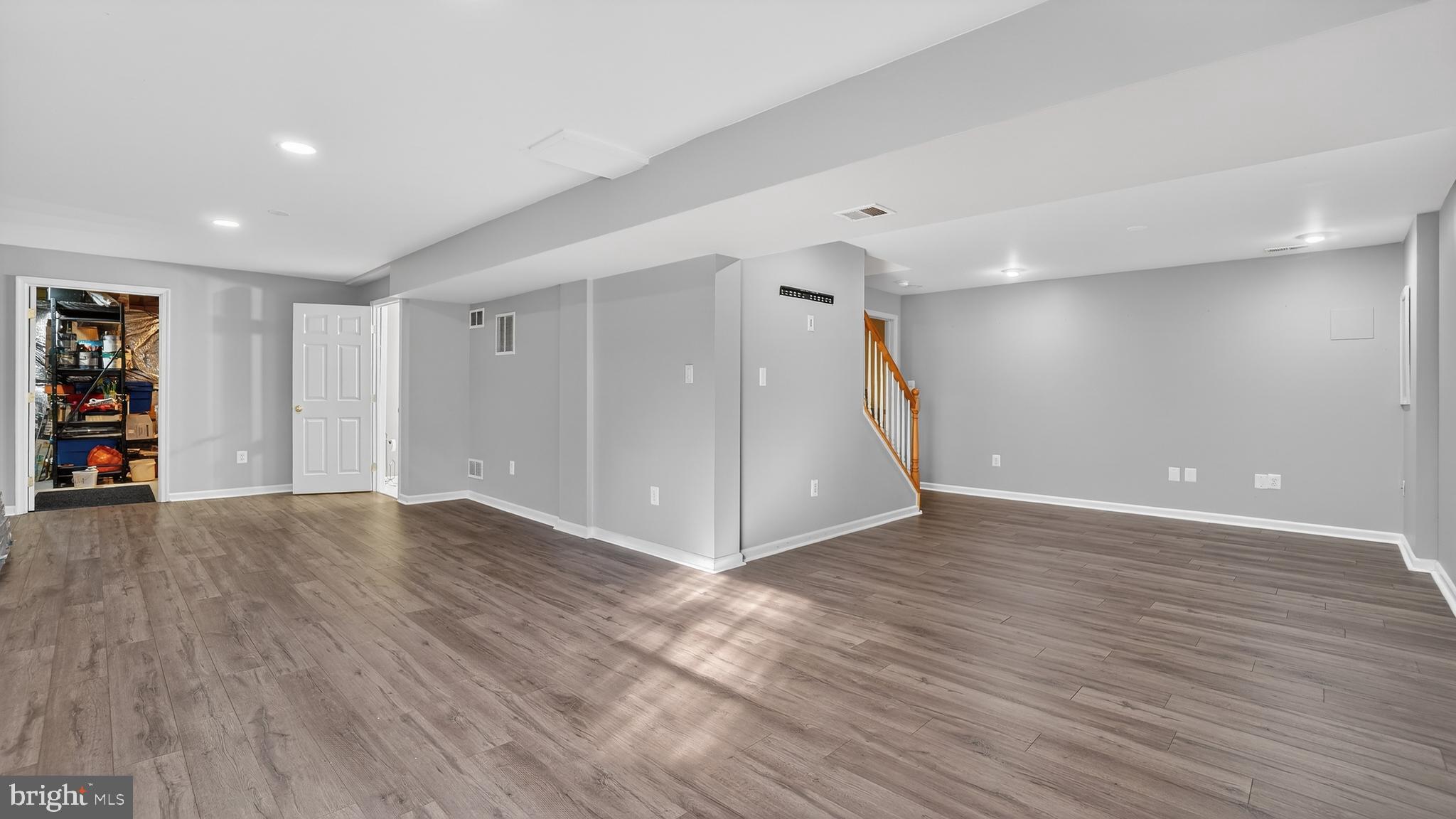 2801 Klein Court Crofton, MD 21114 - Photo 34 of 46 a view of an empty room with wooden floor and closet
