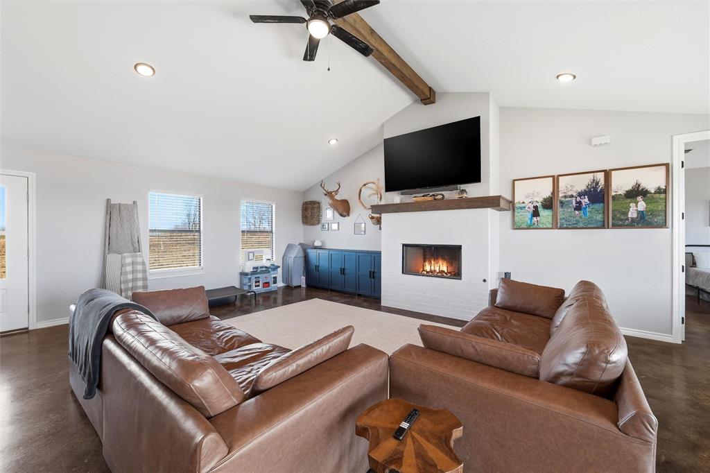 861 Richland Bnd Road Milford, TX 76670 - Photo 17 of 38 a living room with furniture fireplace and flat screen tv