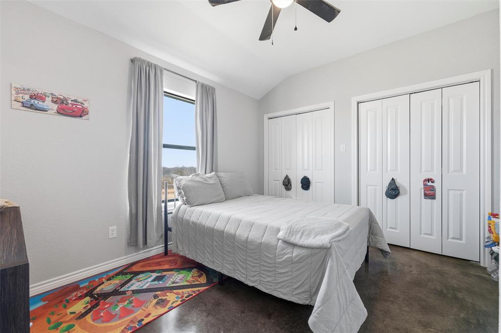 861 Richland Bnd Road Milford, TX 76670 - Photo 26 of 38 a bedroom with a bed and a window