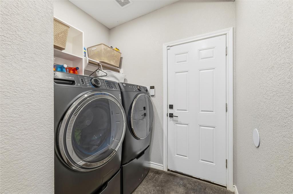 861 Richland Bnd Road Milford, TX 76670 - Photo 28 of 38 a utility room with dryer and washer