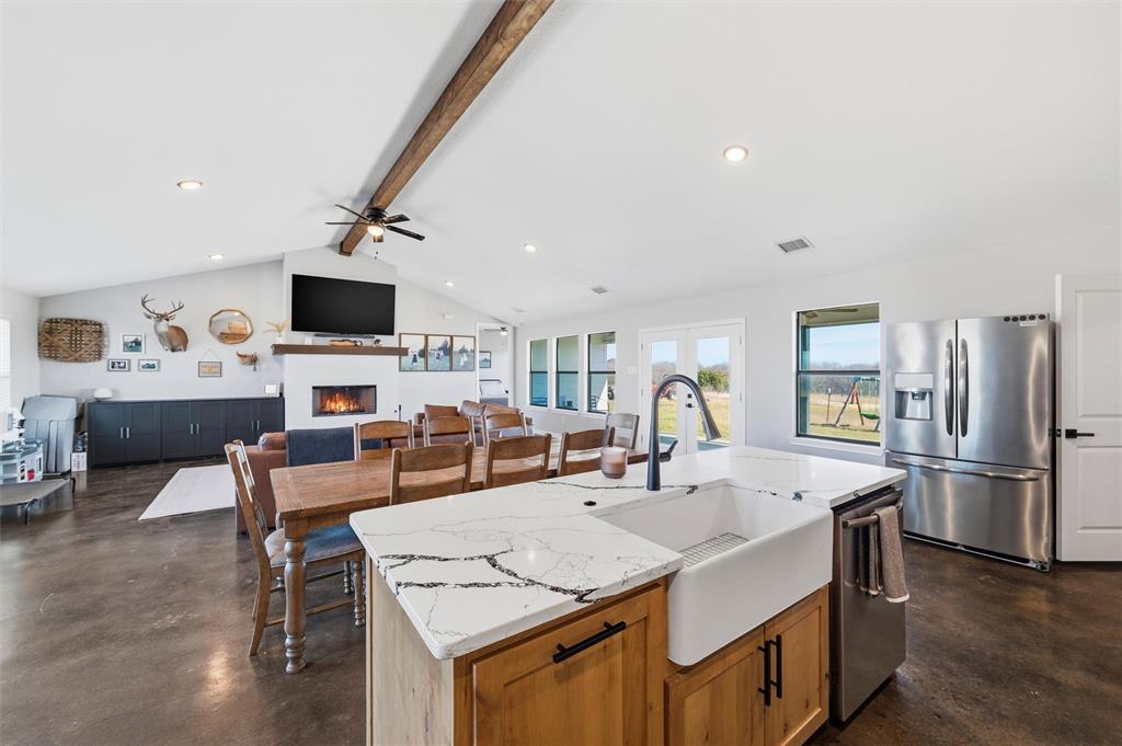 861 Richland Bnd Road Milford, TX 76670 - Photo 9 of 38 a view of kitchen with cabinets and wooden floor