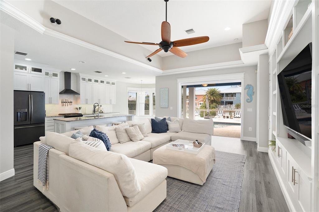 6408 Key Island Avenue Apollo Beach, FL 33572 - Photo 13 of 54 a living room with furniture and a flat screen tv