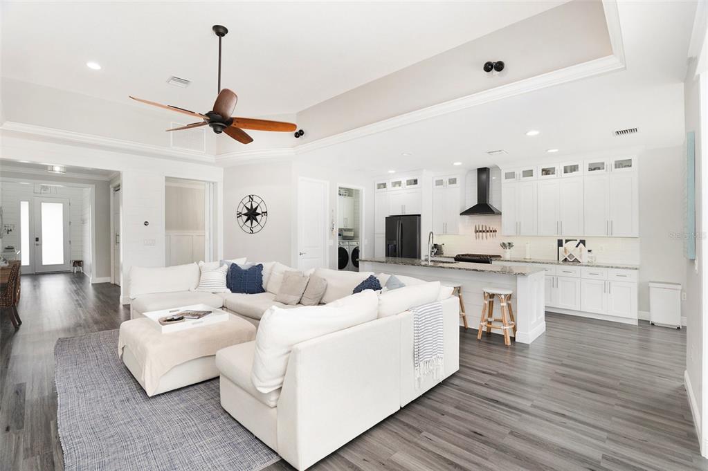 6408 Key Island Avenue Apollo Beach, FL 33572 - Photo 16 of 54 a living room with furniture and a wooden floor