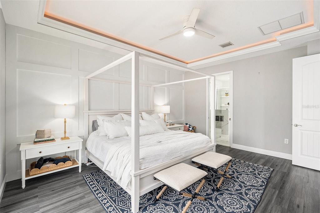 6408 Key Island Avenue Apollo Beach, FL 33572 - Photo 25 of 54 a bedroom with a bed and wooden floor