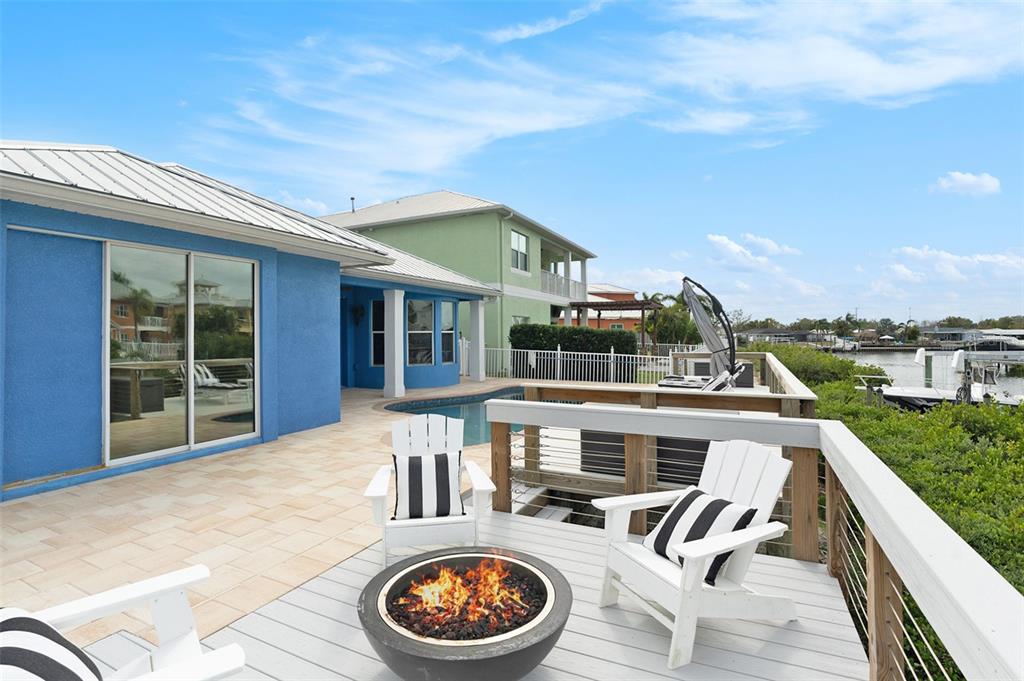 6408 Key Island Avenue Apollo Beach, FL 33572 - Photo 38 of 54 a front view of house with yard outdoor seating and barbeque oven