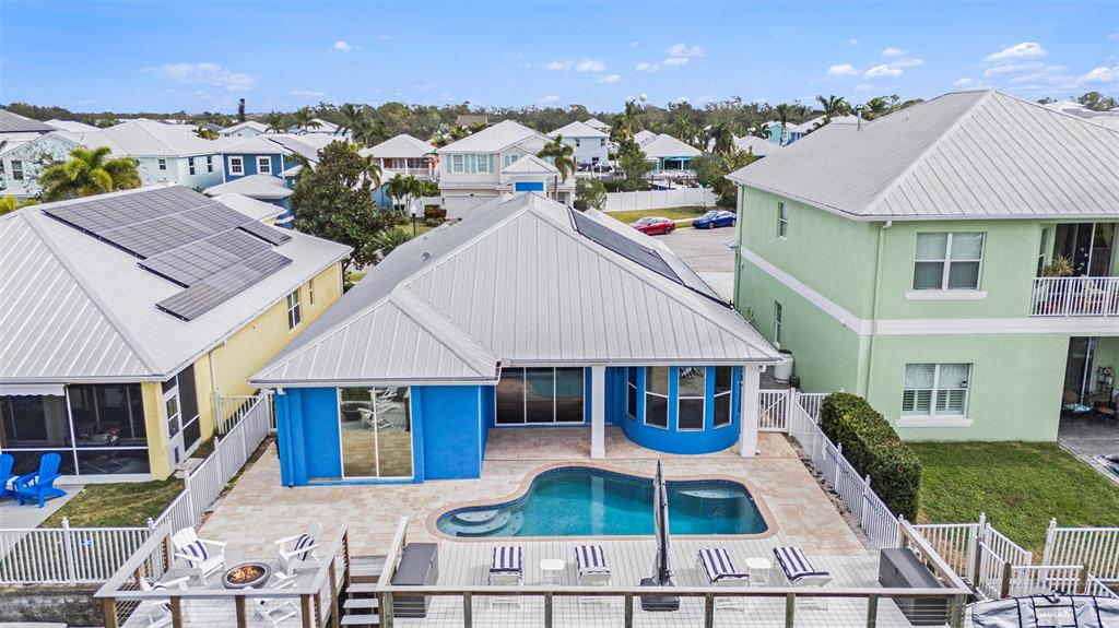 6408 Key Island Avenue Apollo Beach, FL 33572 - Photo 4 of 54 a aerial view of a house with swimming pool and furniture