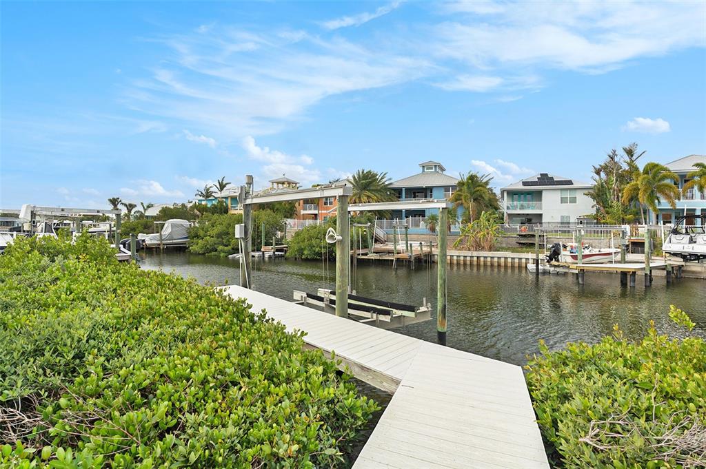 6408 Key Island Avenue Apollo Beach, FL 33572 - Photo 48 of 54 a view of a water with a building in the back