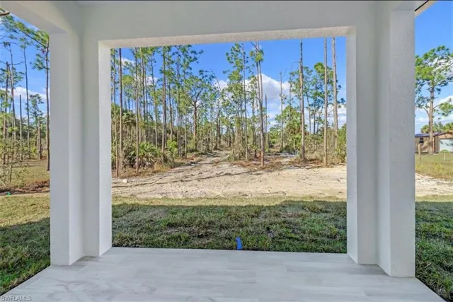 a house view with a backyard space