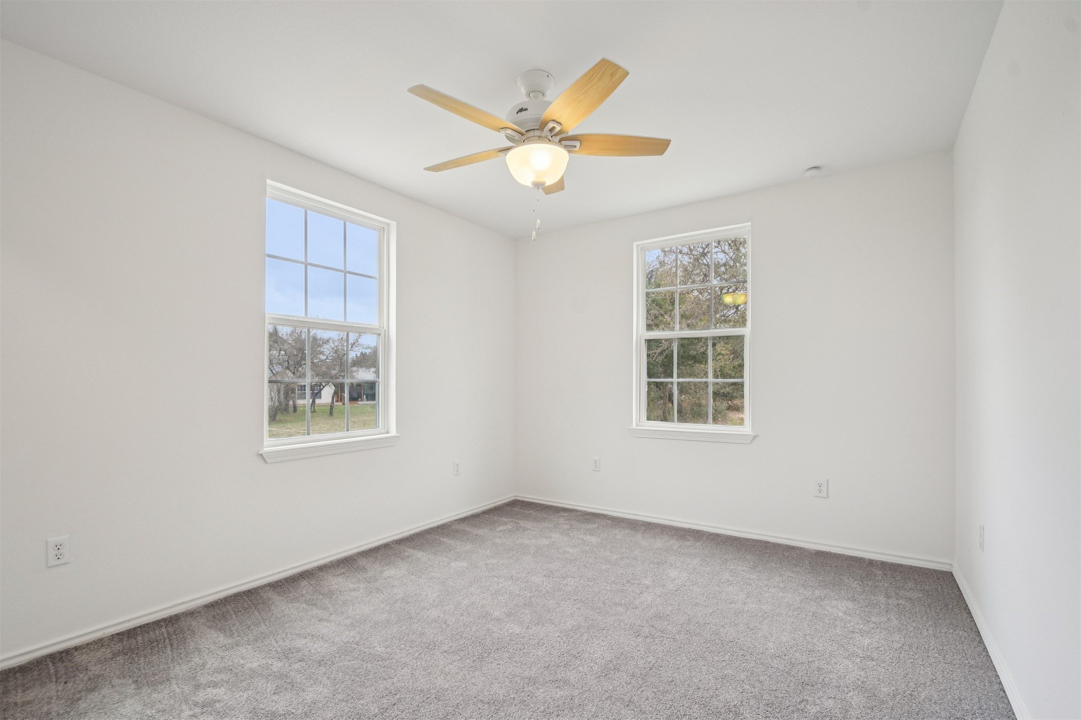 1470 Oak Grove Road Leander, TX 78641 - Photo 18 of 38 an empty room with a window and a ceiling fan