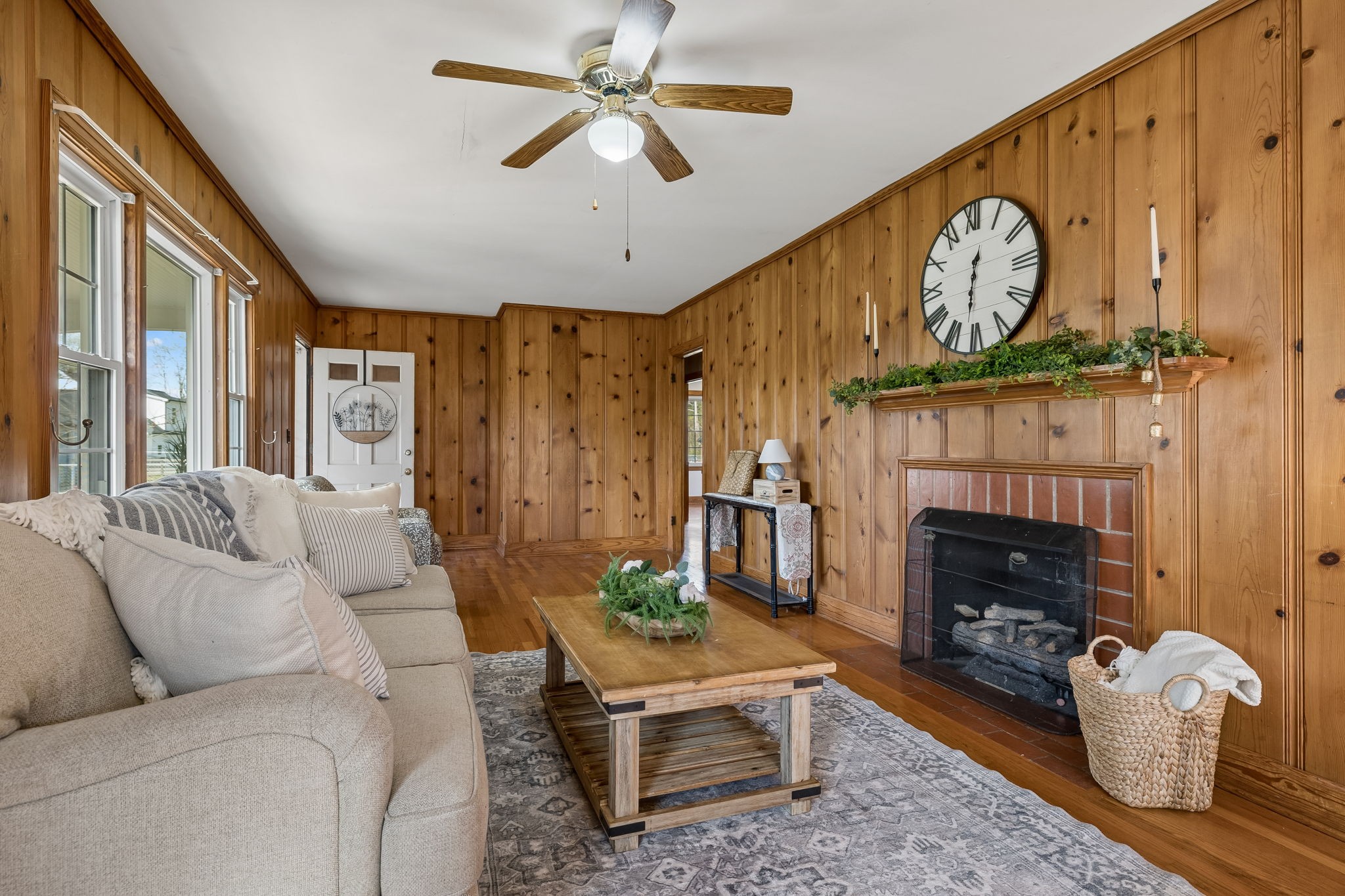 3026 Dilton Mankin Road Murfreesboro, TN 37127 - Photo 12 of 64 a living room with furniture a fireplace and a large window
