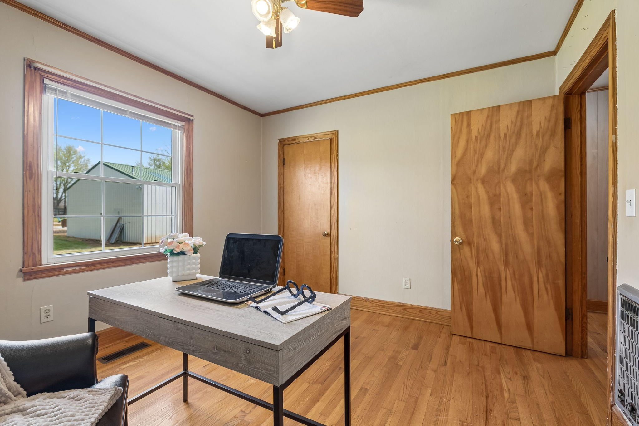 3026 Dilton Mankin Road Murfreesboro, TN 37127 - Photo 23 of 64 a view of a workspace with furniture and a window