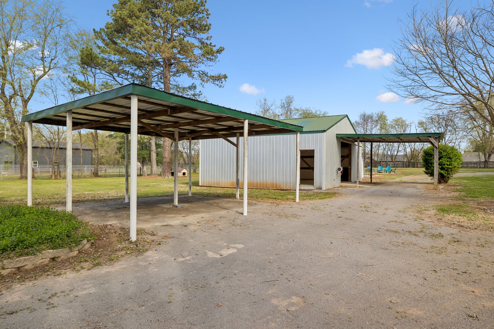 3026 Dilton Mankin Road Murfreesboro, TN 37127 - Photo 27 of 64 a view of a house with a backyard