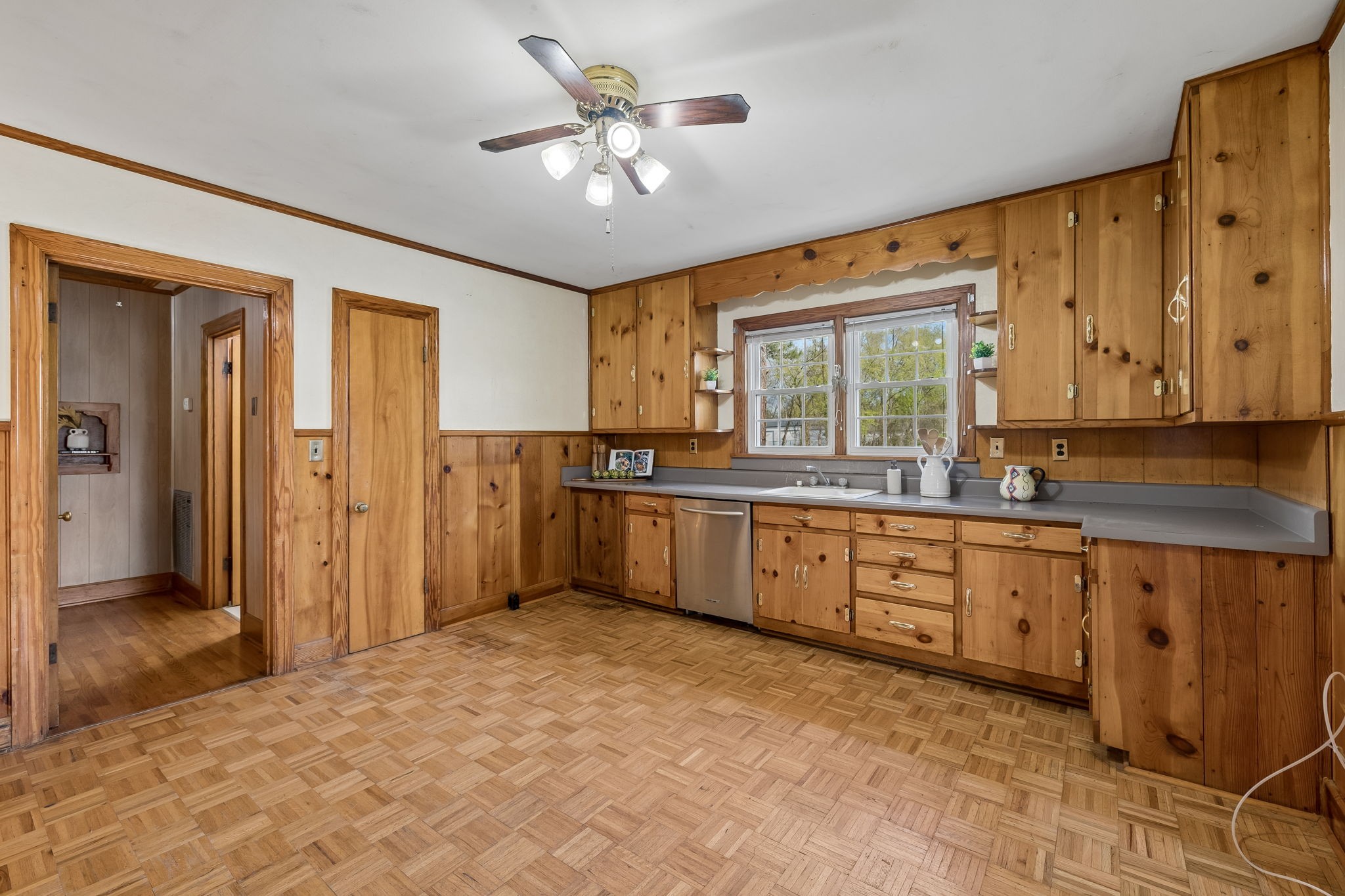3026 Dilton Mankin Road Murfreesboro, TN 37127 - Photo 37 of 64 a kitchen with granite countertop a sink cabinets stainless steel appliances and a large window