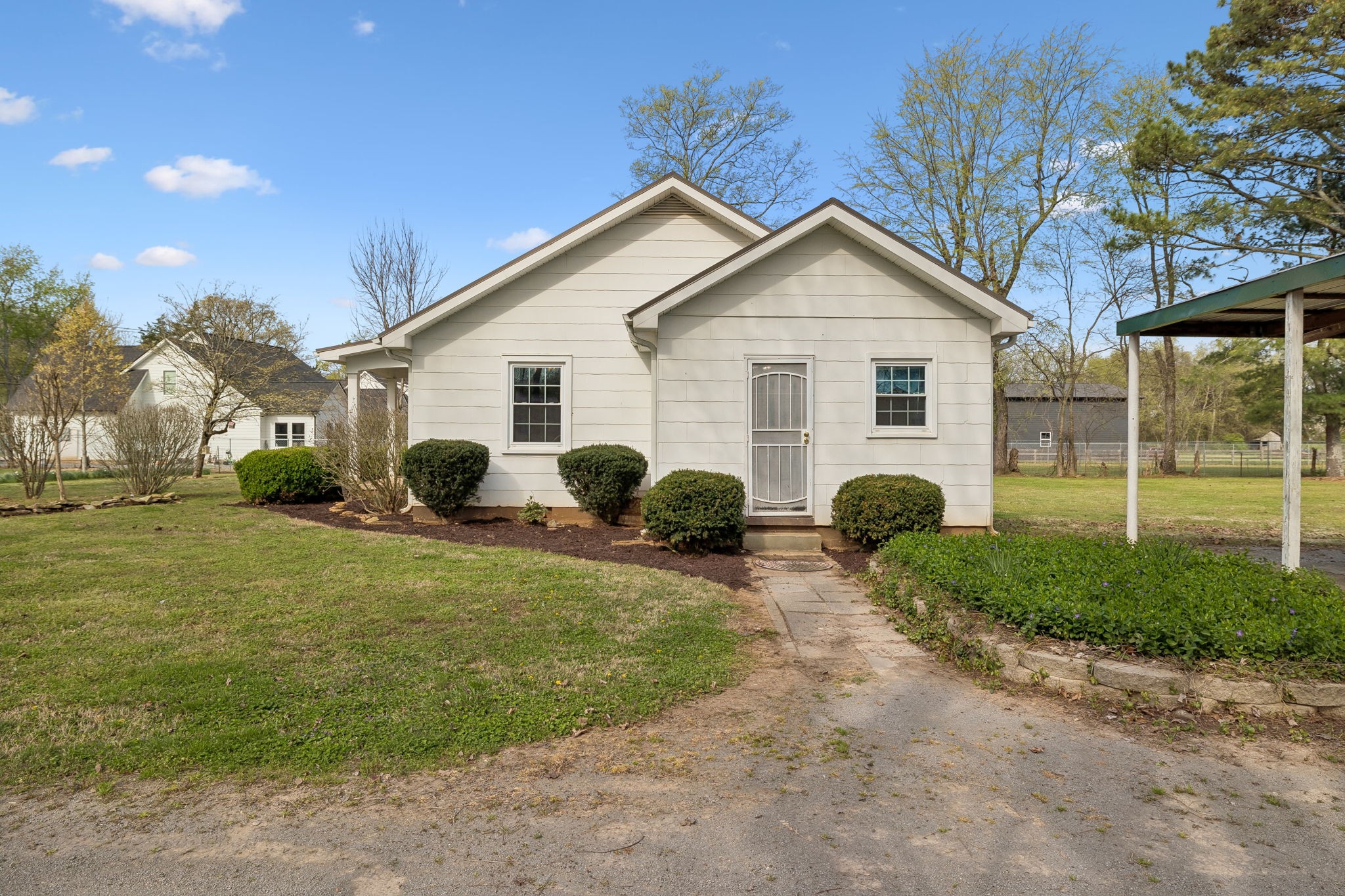 3026 Dilton Mankin Road Murfreesboro, TN 37127 - Photo 40 of 64 a view of a house with backyard and garden