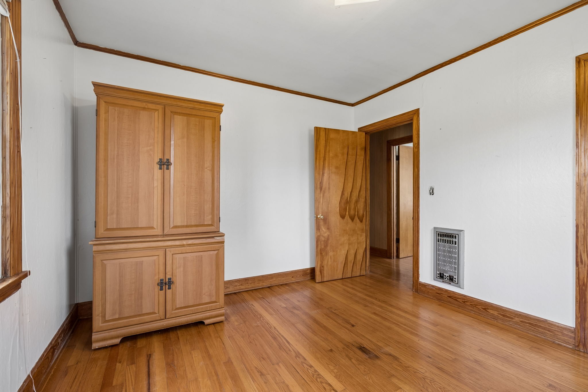 3026 Dilton Mankin Road Murfreesboro, TN 37127 - Photo 43 of 64 an empty room with wooden floor and closet