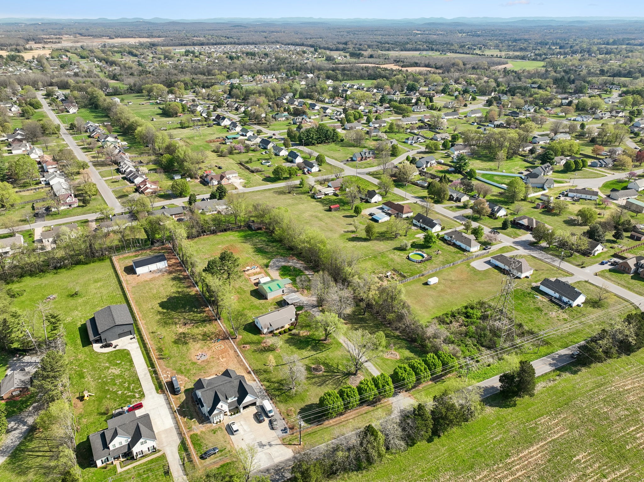 3026 Dilton Mankin Road Murfreesboro, TN 37127 - Photo 57 of 64 an aerial view of residential houses with outdoor space
