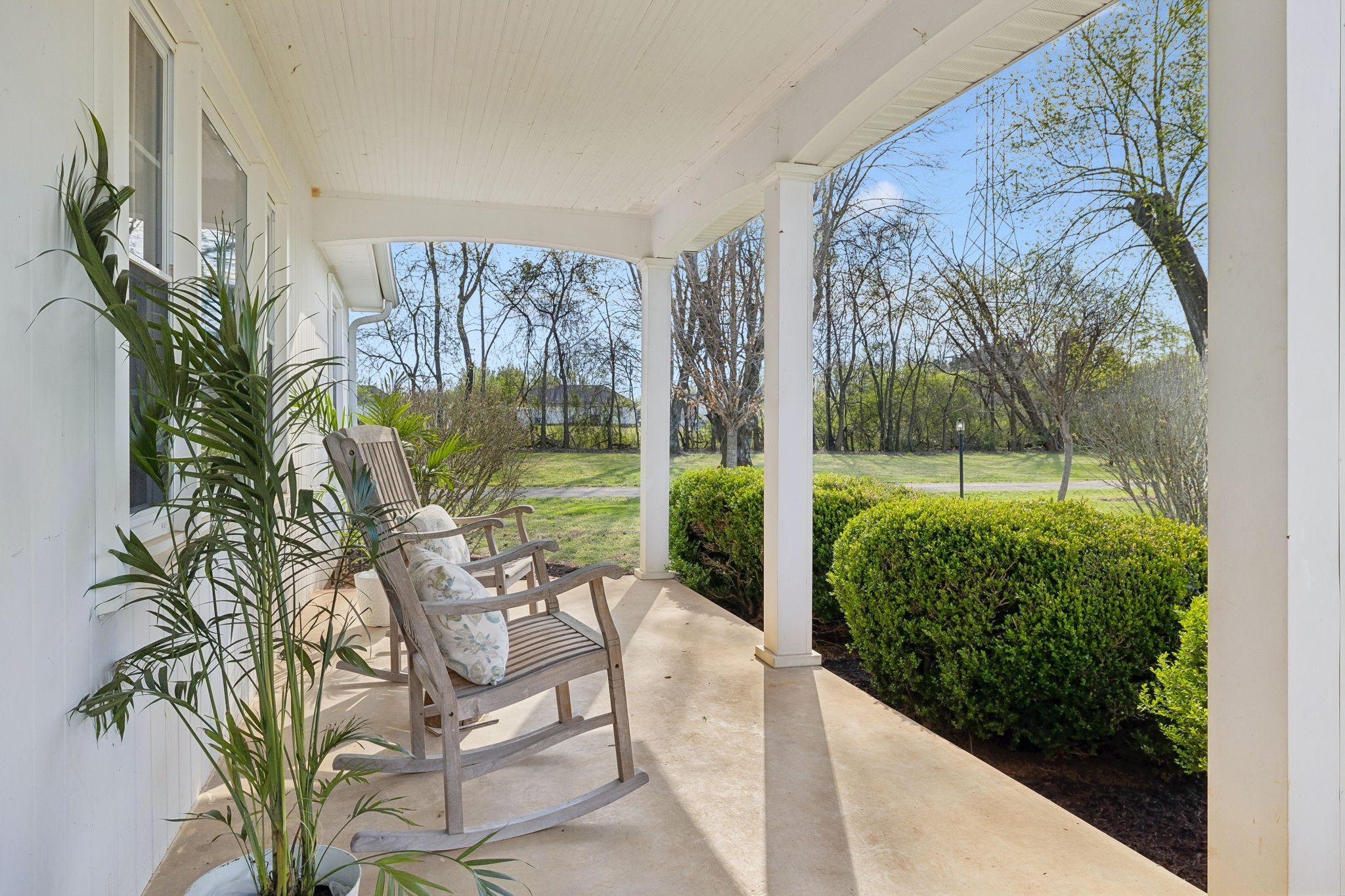 3026 Dilton Mankin Road Murfreesboro, TN 37127 - Photo 7 of 64 a view of a porch with chairs and potted plants