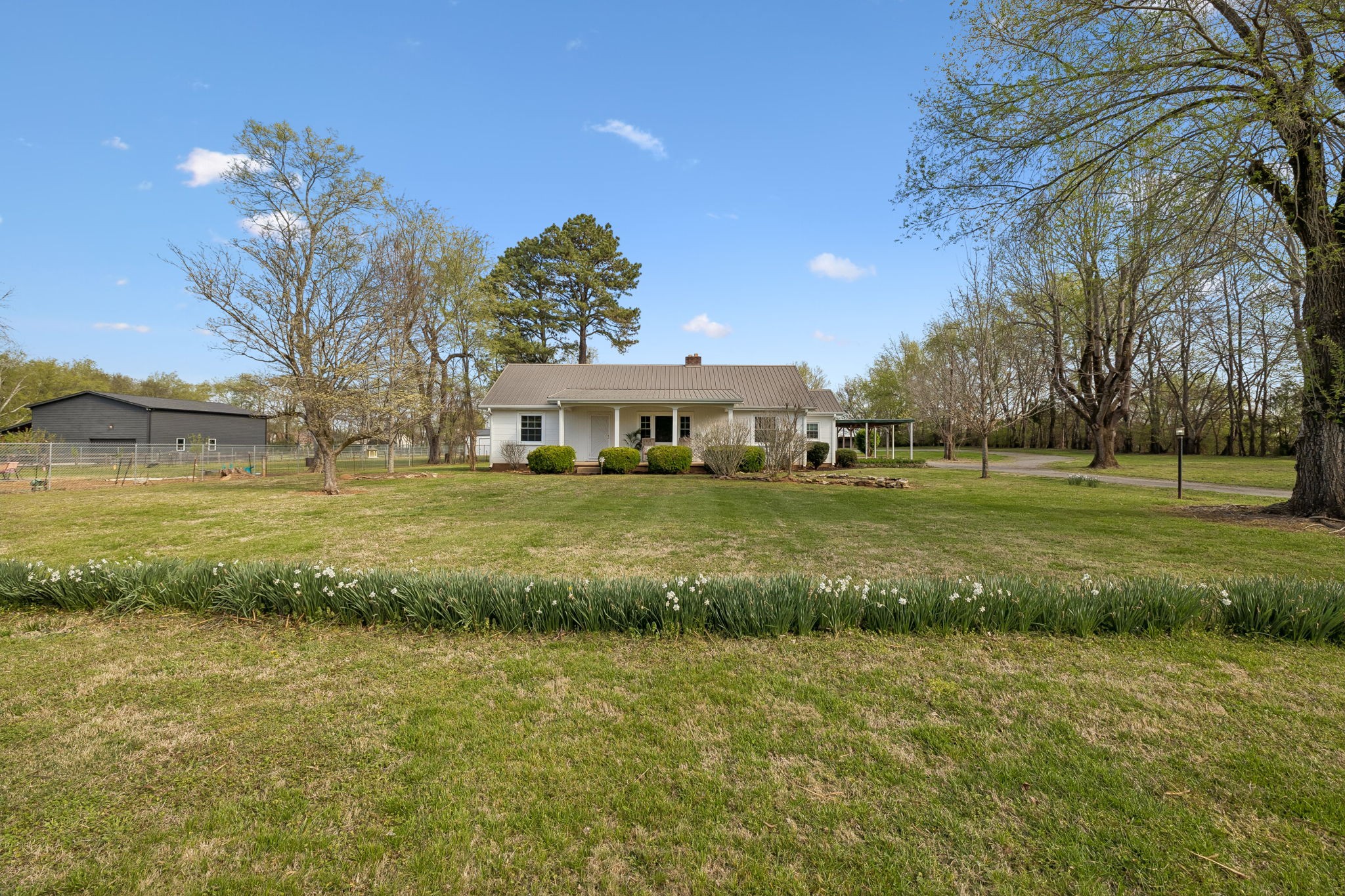 3026 Dilton Mankin Road Murfreesboro, TN 37127 - Photo 9 of 64 a view of a house with a big yard