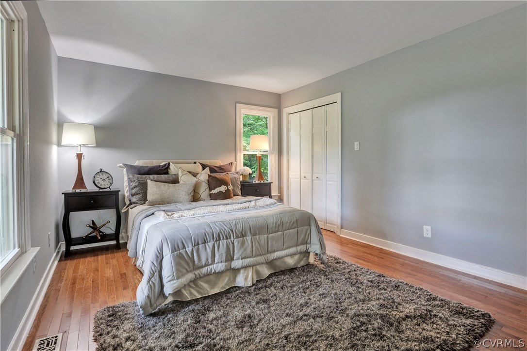 11505 Winterpock Road Chesterfield, VA 23838 - Photo 12 of 30 a bedroom with a bed and a rug