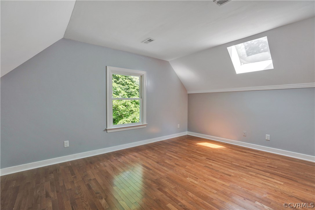 11505 Winterpock Road Chesterfield, VA 23838 - Photo 16 of 30 an empty room with wooden floor and windows