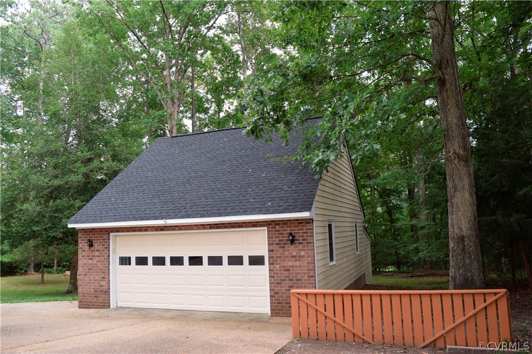 11505 Winterpock Road Chesterfield, VA 23838 - Photo 26 of 30 a view of a house with a yard plants and large tree