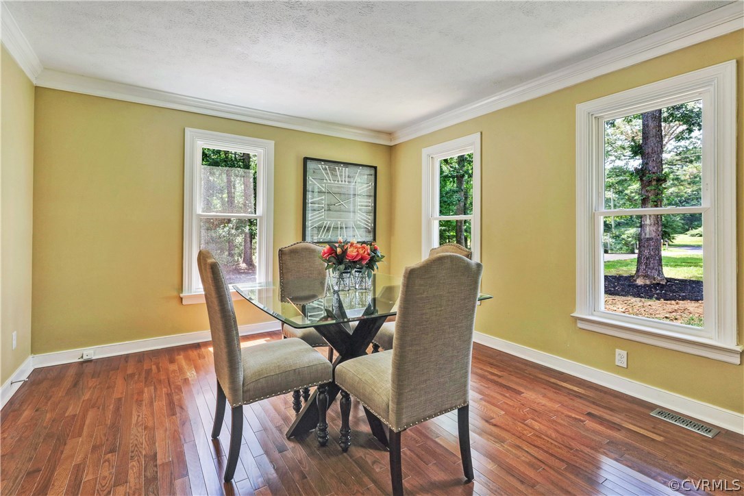 11505 Winterpock Road Chesterfield, VA 23838 - Photo 9 of 30 a view of a dining room with furniture and a window