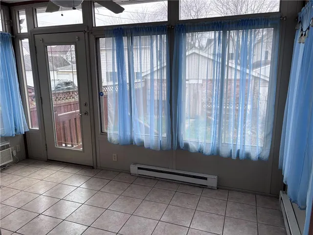 a view of a room with windows