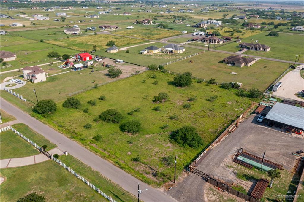 502 Nadia Street Weslaco, TX 78596 - Photo 2 of 5 Aerial overview of property's location featuring rural landscape