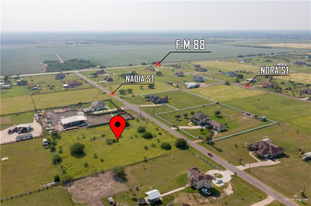502 Nadia Street Weslaco, TX 78596 - Photo 4 of 5 Aerial view of property's location with rural landscape