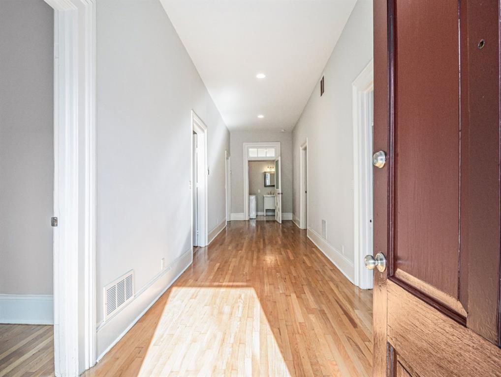 74 Boulevard Southeast Atlanta, GA 30312 - Photo 3 of 11 a view of a hallway with wooden floor