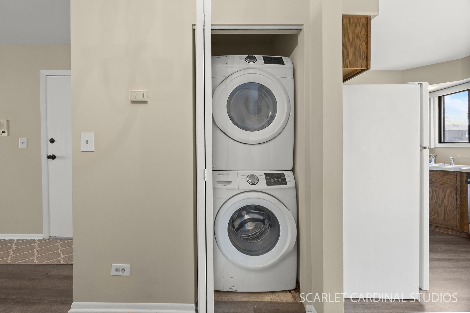 465 Echo Lane, Unit 2 Aurora, IL 60504 - Photo 11 of 12 a view of a hallway with washer and dryer