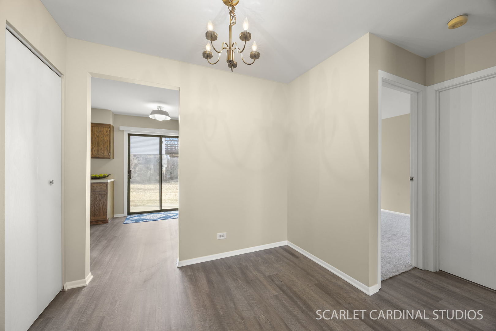 465 Echo Lane, Unit 2 Aurora, IL 60504 - Photo 4 of 12 wooden floor in an empty room with a window