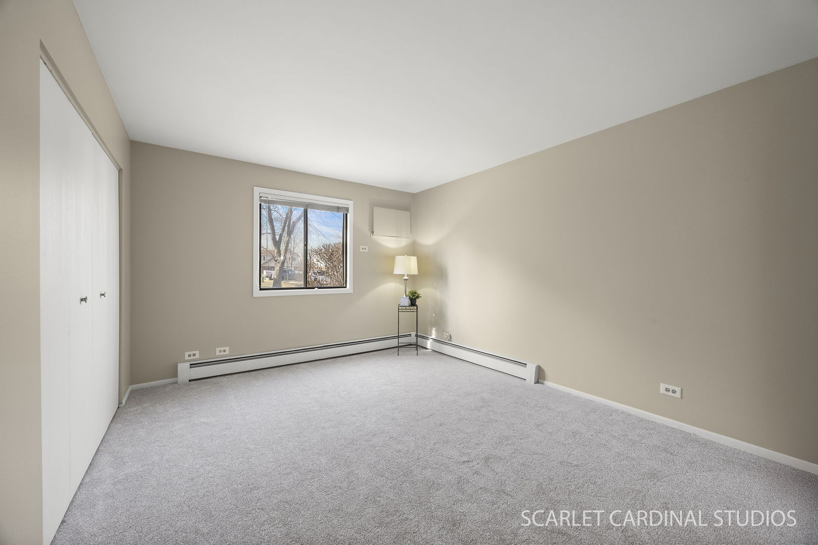 465 Echo Lane, Unit 2 Aurora, IL 60504 - Photo 7 of 12 an empty room with windows