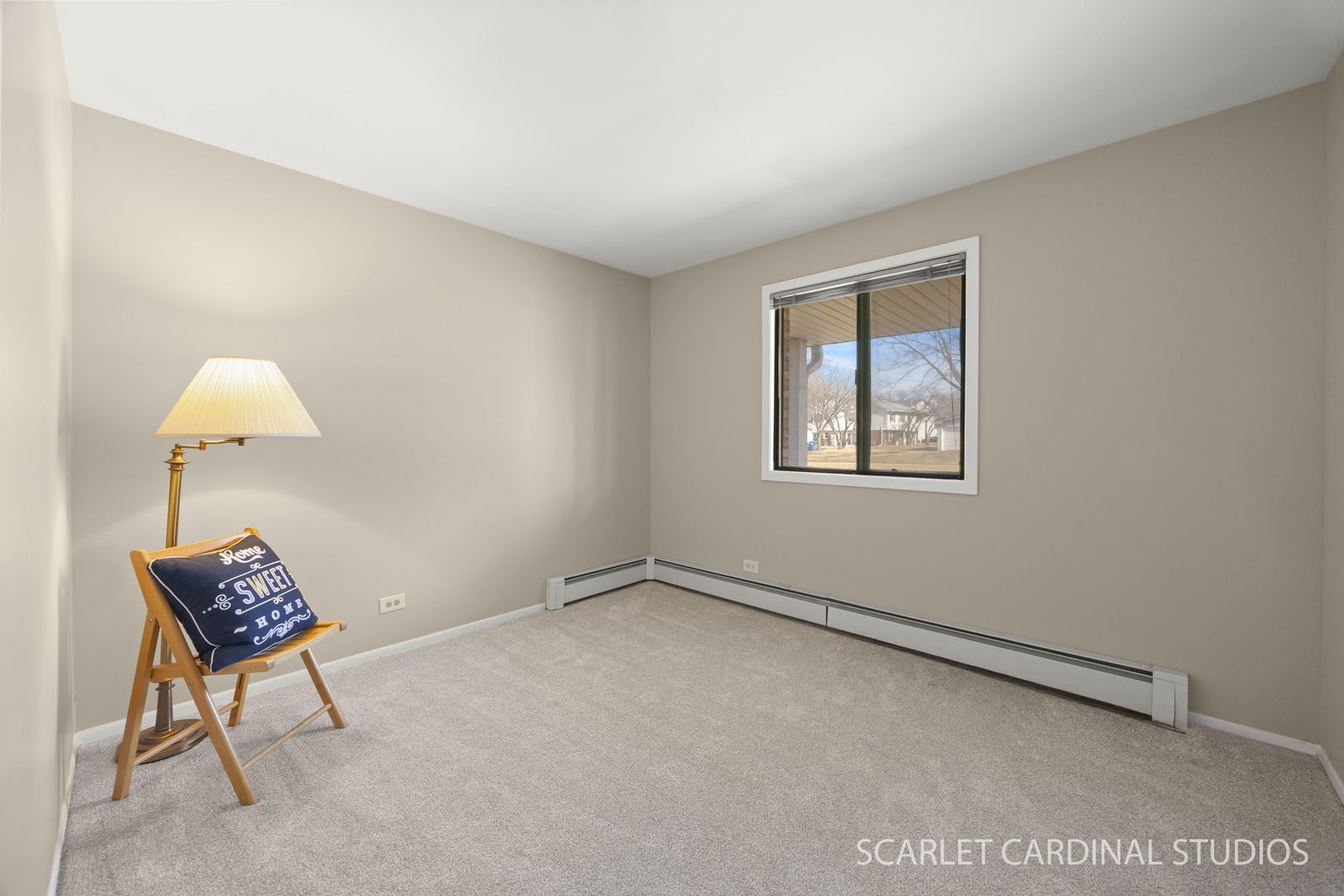 465 Echo Lane, Unit 2 Aurora, IL 60504 - Photo 10 of 12 a view of an empty room with a window