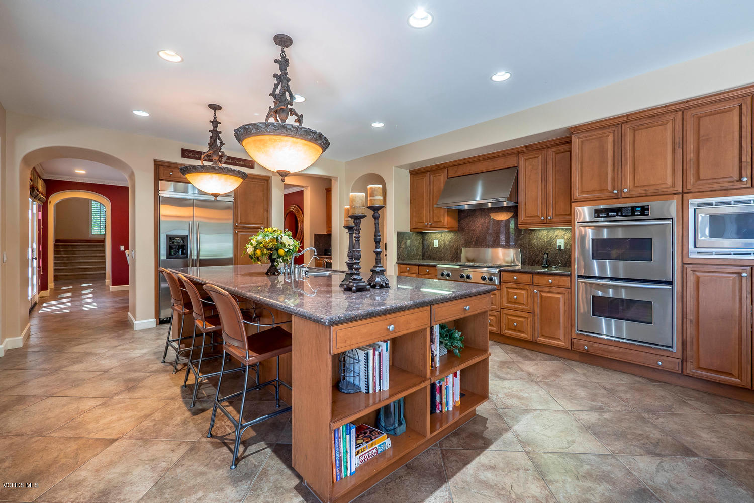 782 Running Creek Simi Valley, CA 93065 - Photo 17 of 49 a kitchen with stainless steel appliances granite countertop a stove a sink and a refrigerator