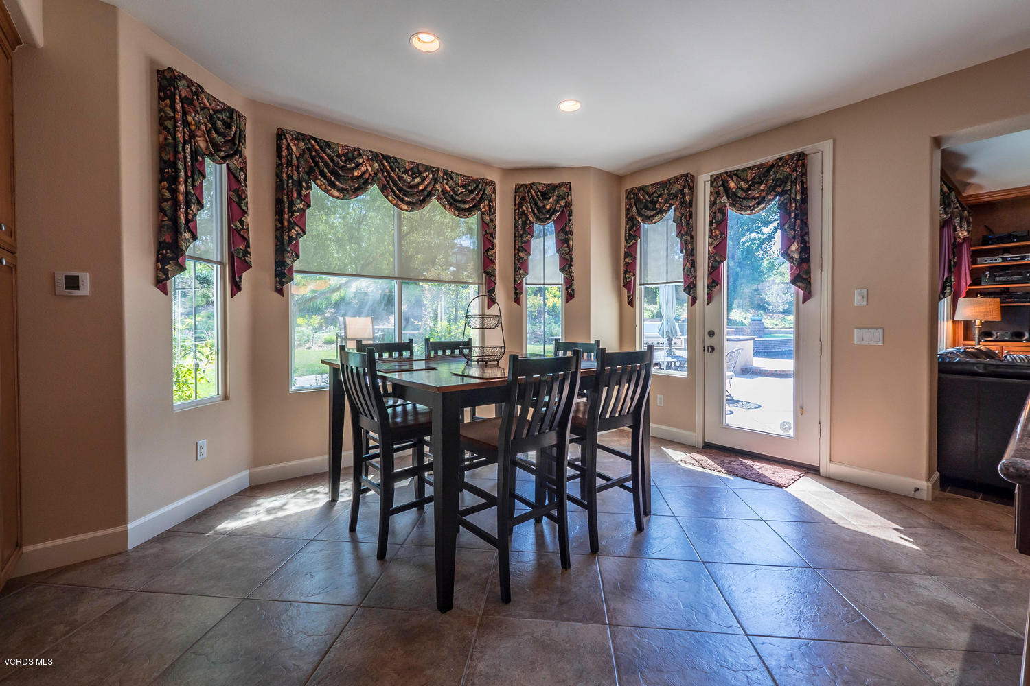 782 Running Creek Simi Valley, CA 93065 - Photo 18 of 49 a view of a dining room with furniture window and outside view