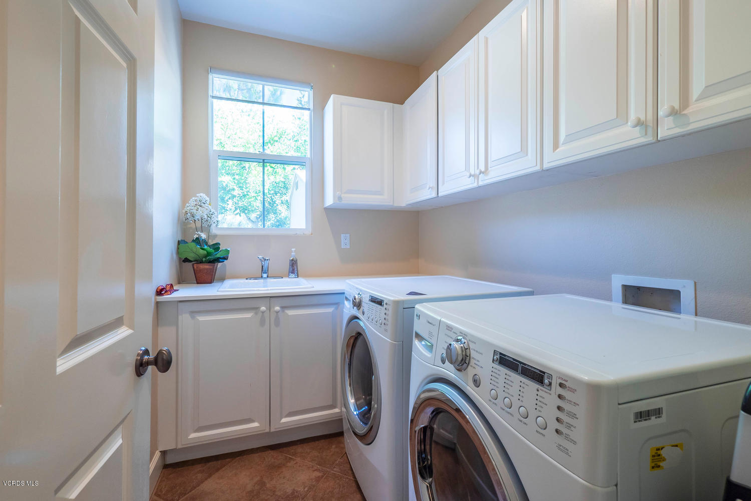 782 Running Creek Simi Valley, CA 93065 - Photo 23 of 49 a utility room with dryer and washer