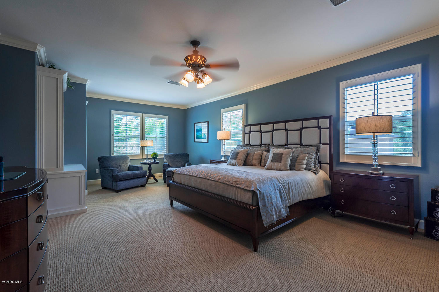 782 Running Creek Simi Valley, CA 93065 - Photo 27 of 49 a spacious bedroom with a bed and a dresser next to a window