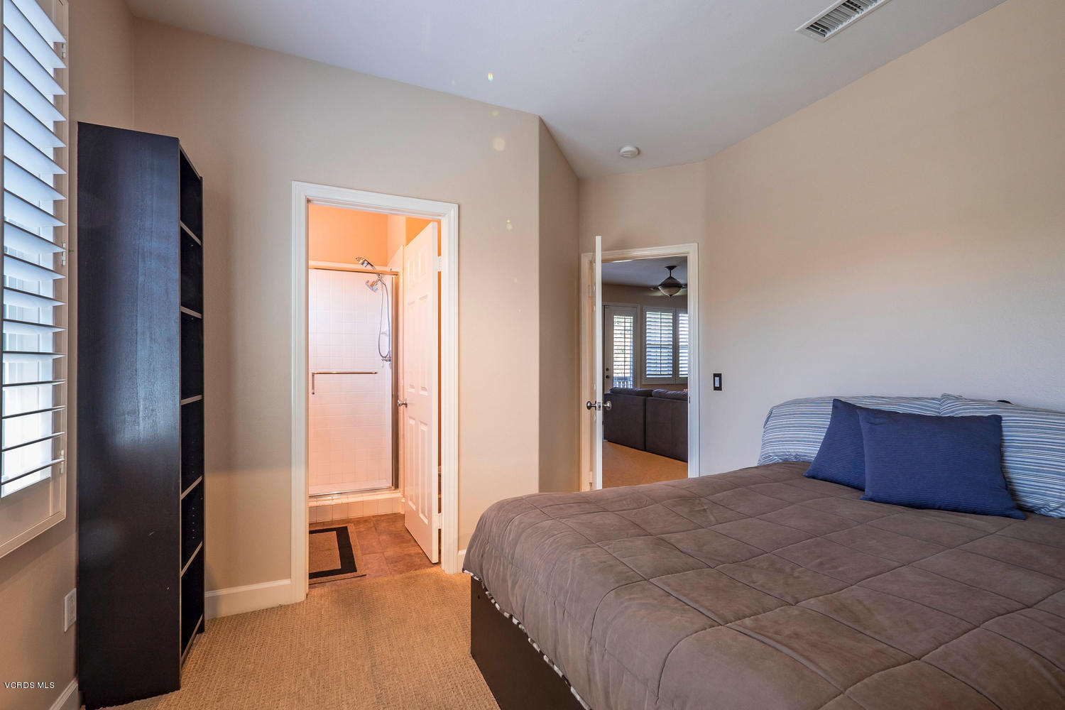 782 Running Creek Simi Valley, CA 93065 - Photo 34 of 49 a bedroom with a large bed and a closet