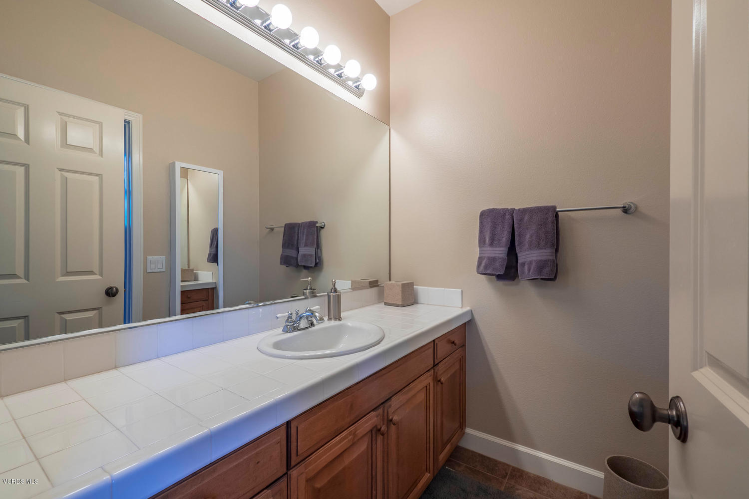 782 Running Creek Simi Valley, CA 93065 - Photo 37 of 49 a bathroom with a sink and a mirror