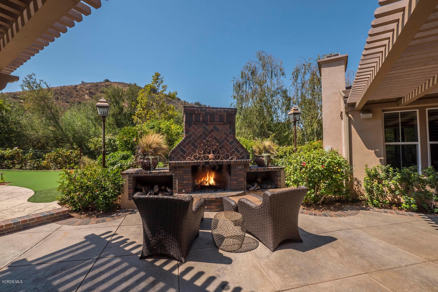 782 Running Creek Simi Valley, CA 93065 - Photo 39 of 49 a table and chairs in front of a house