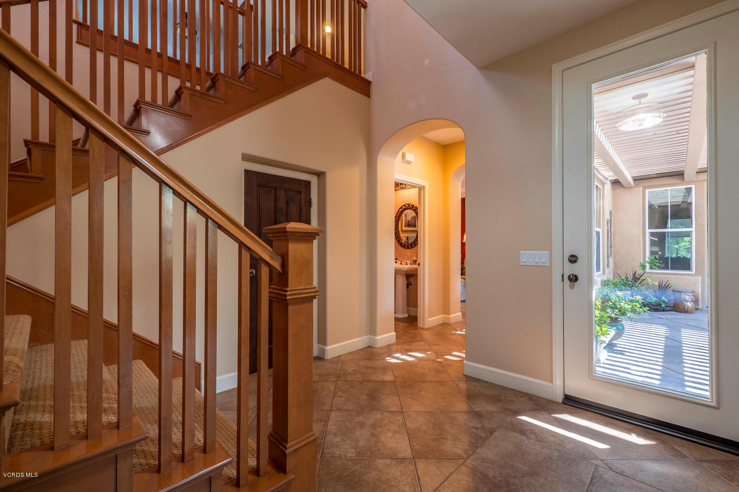 782 Running Creek Simi Valley, CA 93065 - Photo 5 of 49 a view of an entryway door with a staircase