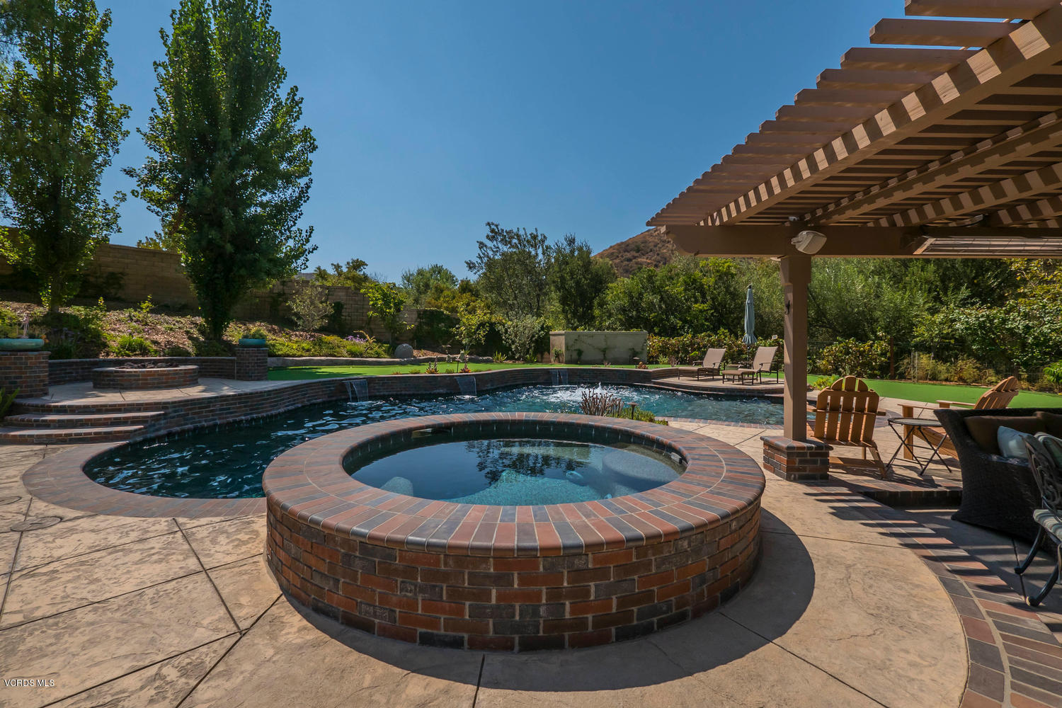 782 Running Creek Simi Valley, CA 93065 - Photo 42 of 49 a view of a swimming pool with a patio