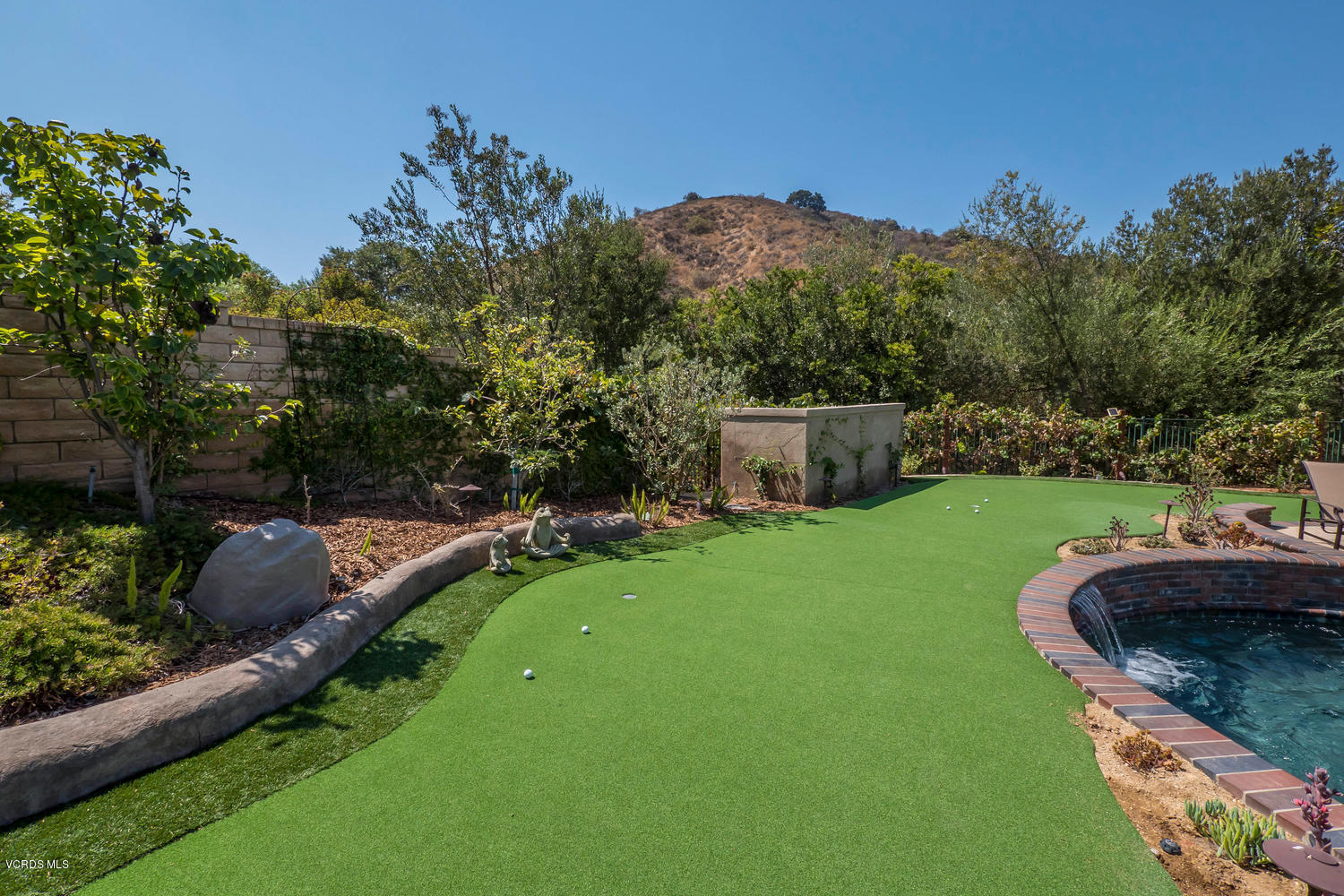 782 Running Creek Simi Valley, CA 93065 - Photo 46 of 49 a view of a backyard with sitting area