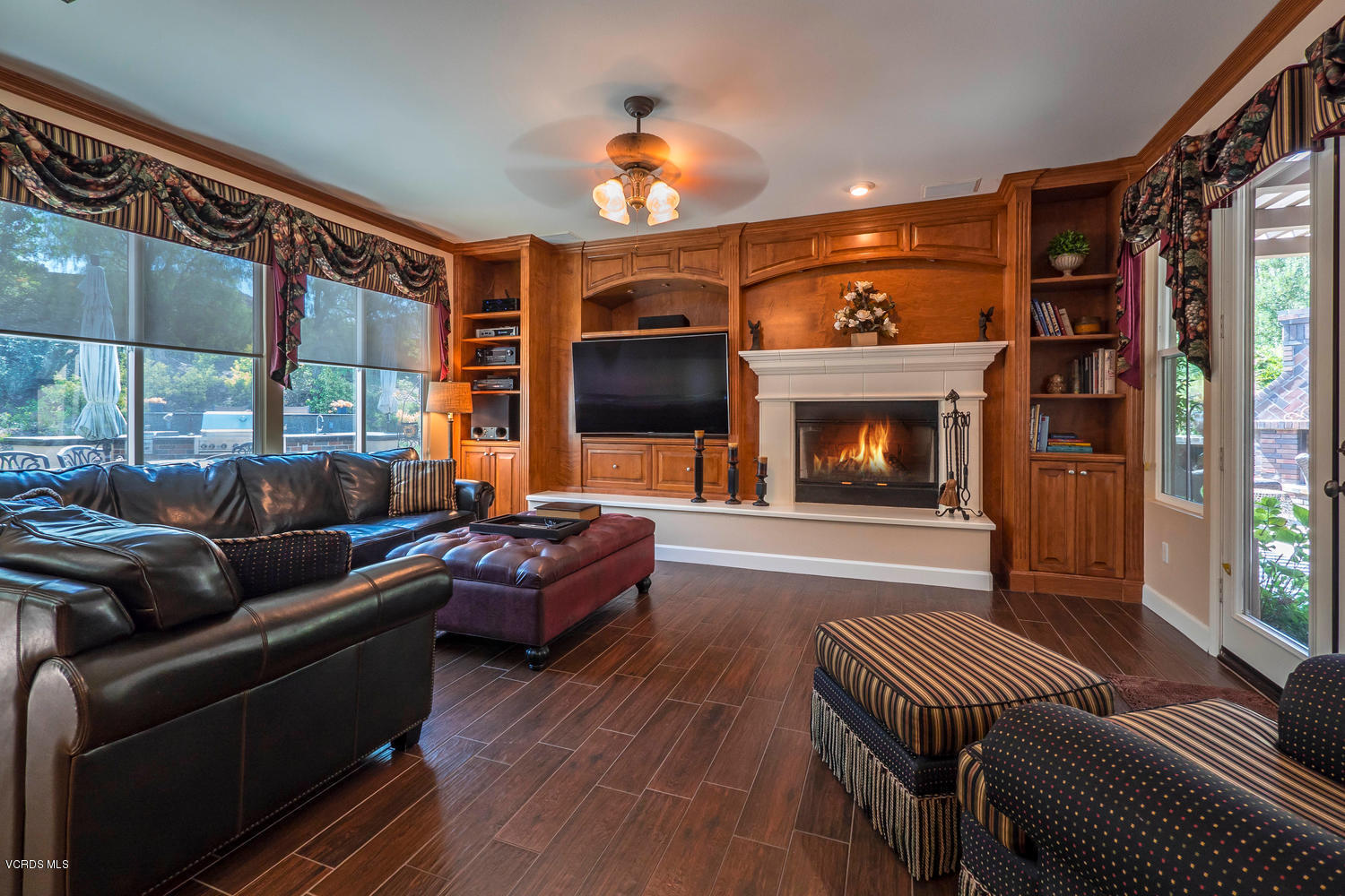 782 Running Creek Simi Valley, CA 93065 - Photo 10 of 49 a living room with furniture and a fireplace