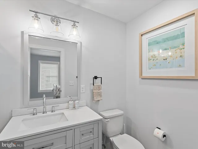 a view of a houses from a balcony