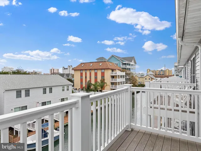 a picture of a bench in front of a wall