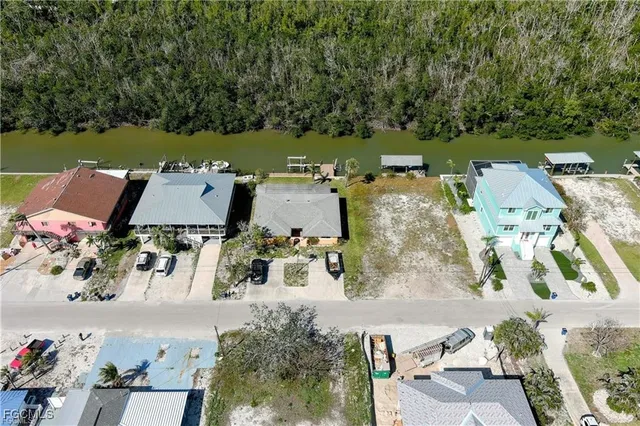 an aerial view of a houses with outdoor space